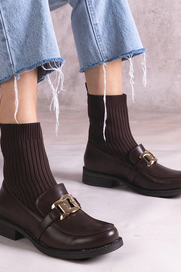 Botas marrons com cano de...