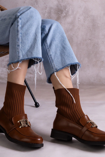 Botas de cano alto em... 2