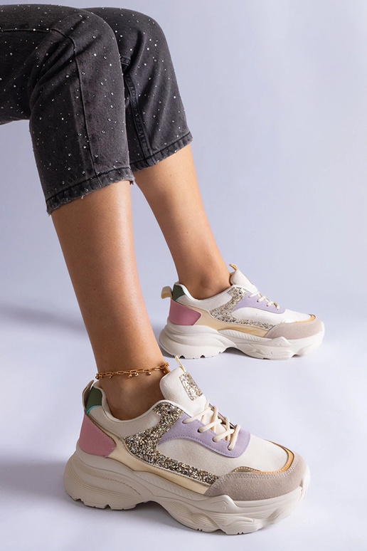 Tênis multicoloridos com apliques de...