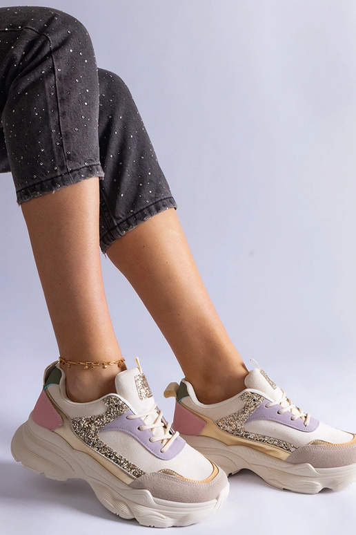 Tênis multicoloridos com apliques de...