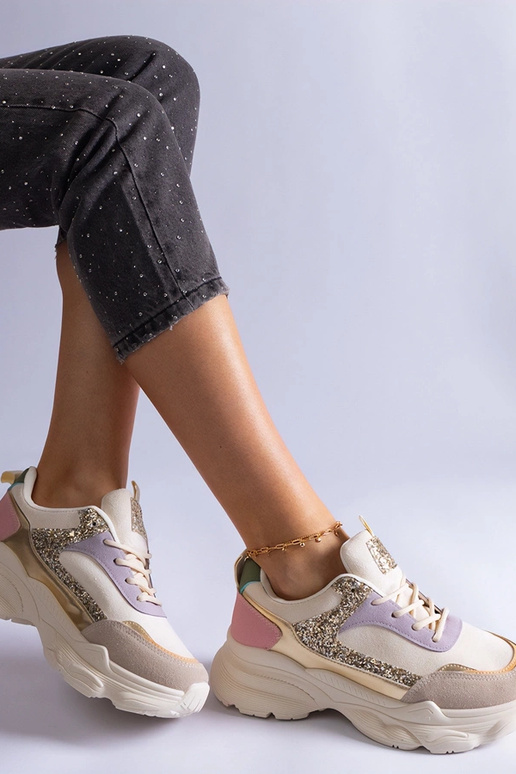 Tênis multicoloridos com apliques de...