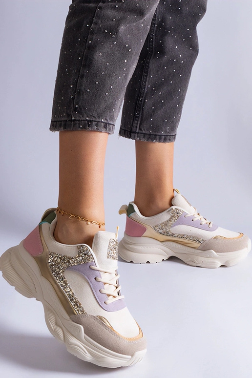 Tênis multicoloridos com apliques de...