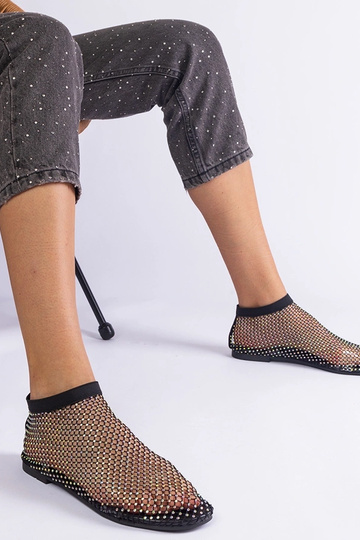 Sandálias de malha preta...