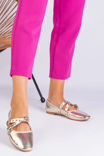 Sapatilhas douradas de... 2