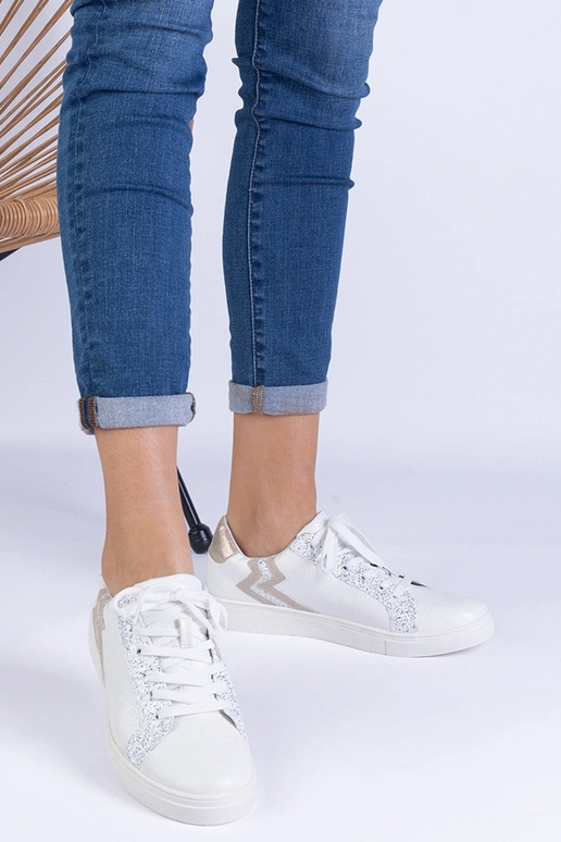 Tênis feminino branco com relevo e...