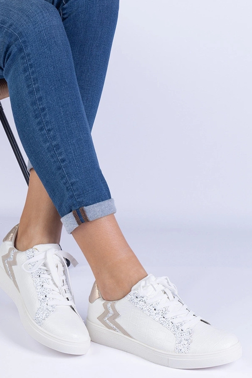 Tênis feminino branco com relevo e...