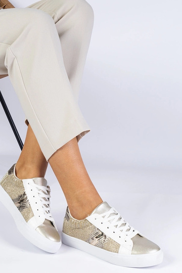 Tênis feminino dourado com...