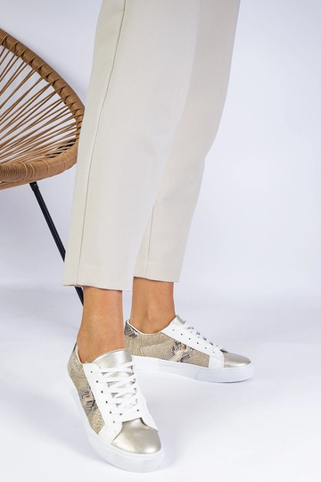 Tênis feminino dourado com... 2