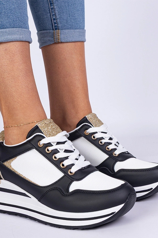 Tênis pretos decorados com glitter e...