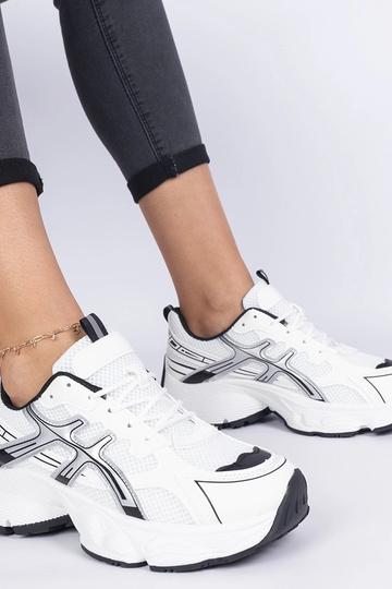 Tênis pretos femininos com... 2