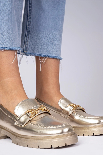 Mocassins dourados...