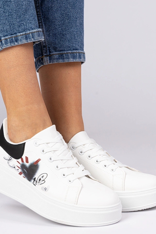 Ténis brancos e pretos femininos com...