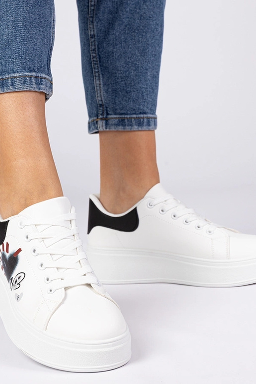 Ténis brancos e pretos femininos com...