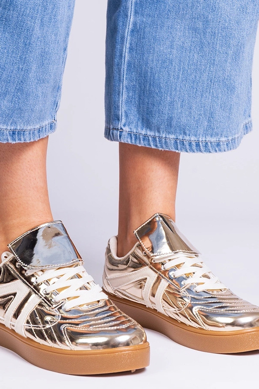 Sneakers dourados femininos...