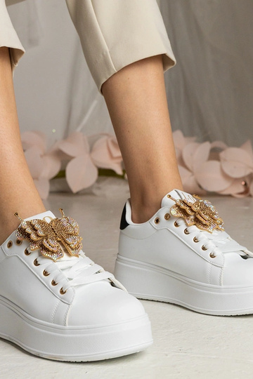 Tênis bicolor com borboleta...