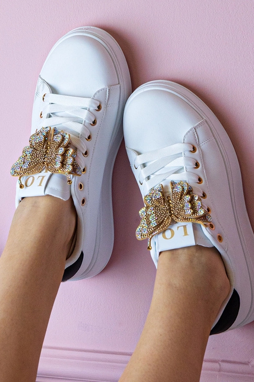 Tênis bicolor com borboleta e...