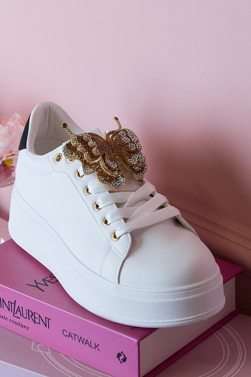 Tênis bicolor com borboleta e...