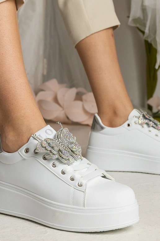 Tênis bicolor com borboleta e...