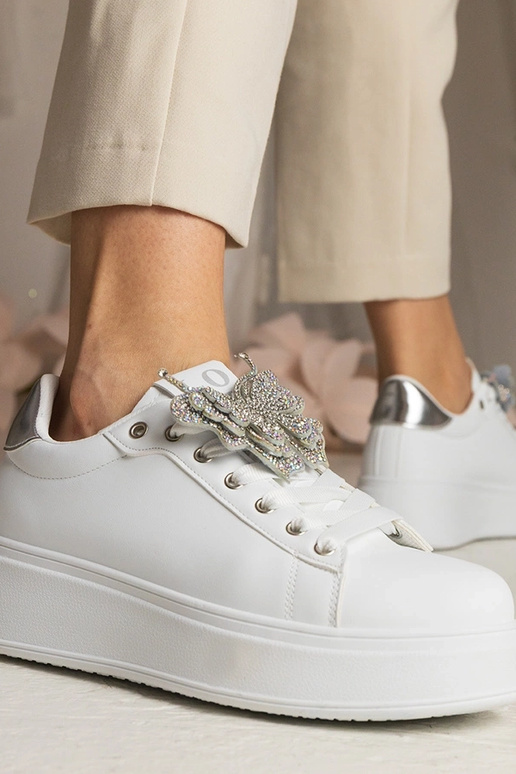 Tênis bicolor com borboleta e...