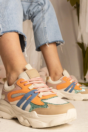 Tênis laranja femininos... 2