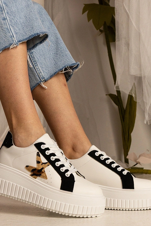 Tênis bicolor decorados com glitter e...