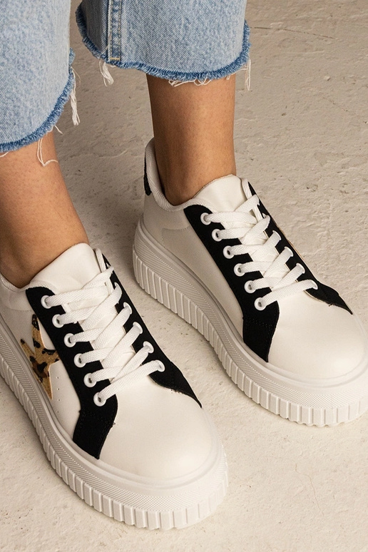 Tênis bicolor decorados com glitter e...