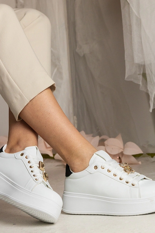 Ténis femininos brancos e pretos...