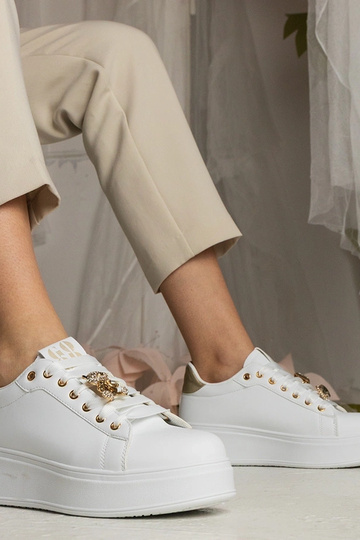 Ténis femininos brancos e...