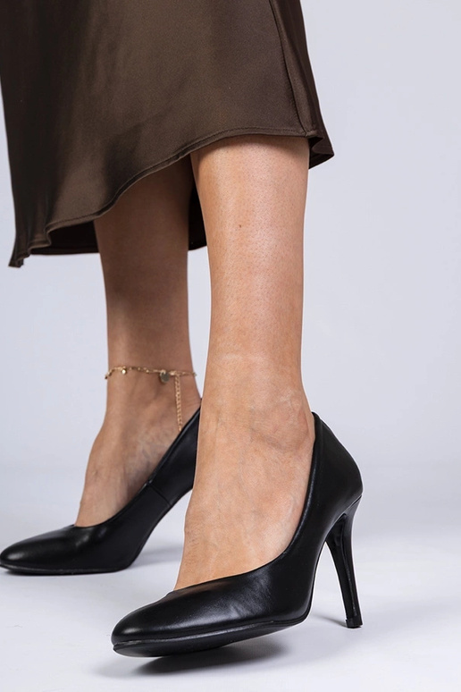 Sapatos femininos pretos clássicos de... Sapatos femininos pretos clássicos de...