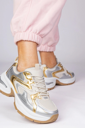 Ténis dourados com sola... 2