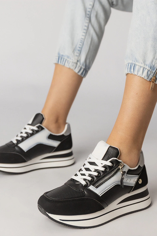 Tênis esportivos pretos com zíper,...