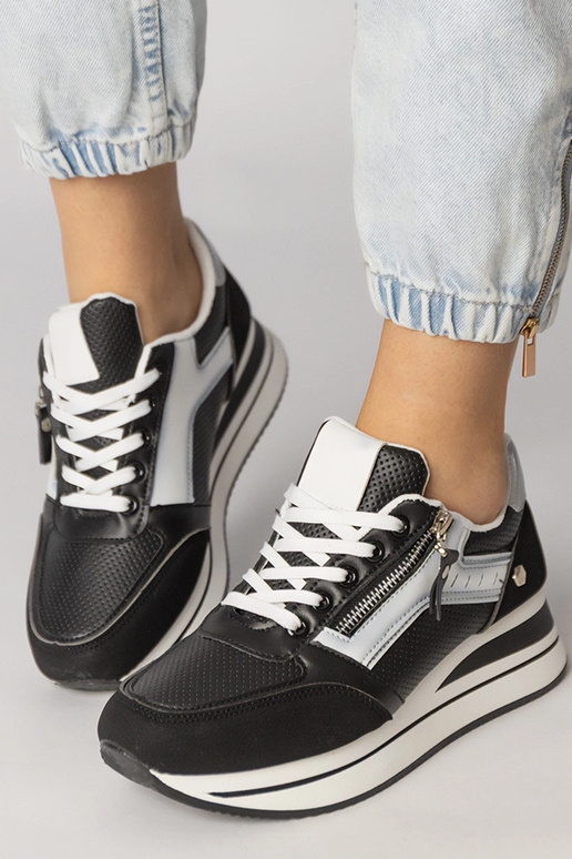 Tênis esportivos pretos com zíper,...