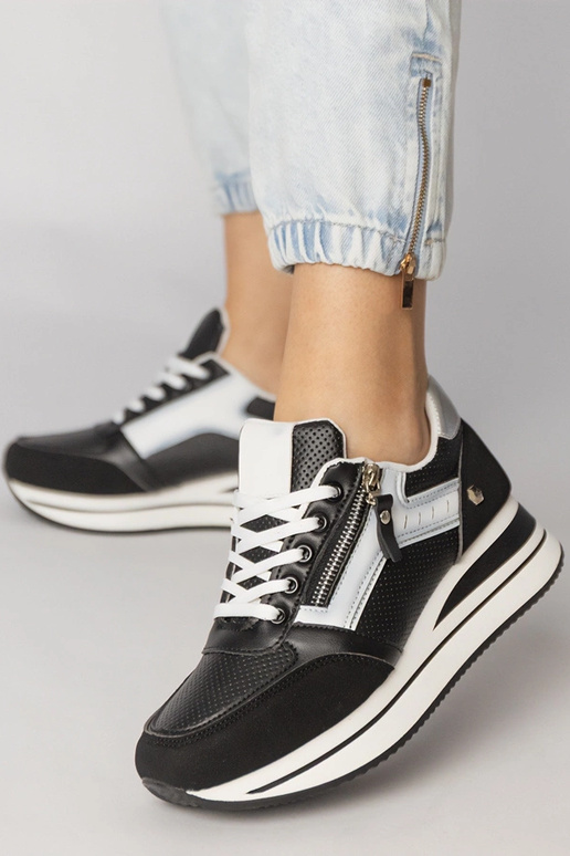 Tênis esportivos pretos com zíper,...