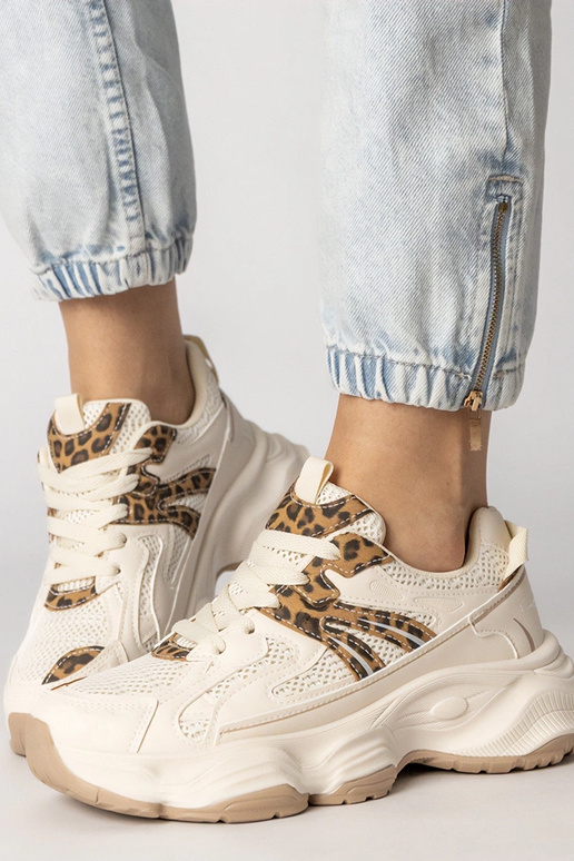 Tênis femininos cor areia com detalhe...