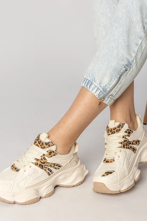 Tênis femininos cor areia com detalhe...