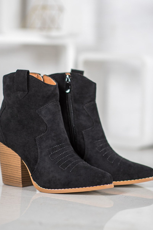 Botas de estilo cowboy com salto