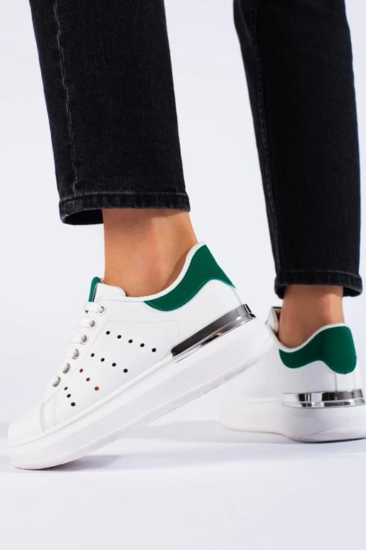 modelo de tênis branco com salto...