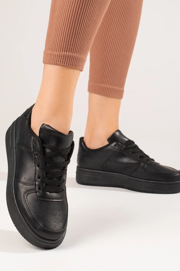 calçados esportivos pretos... 2