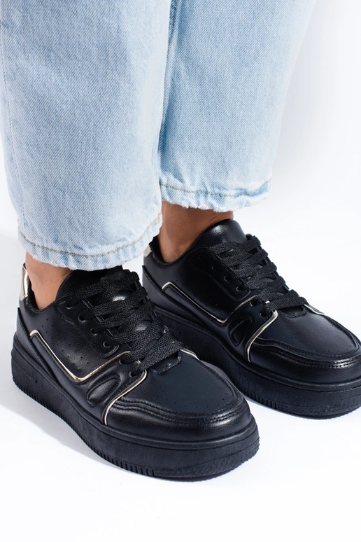 Modelo de tênis preto com plataforma... Modelo de tênis preto com plataforma...