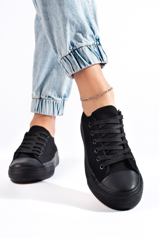 Tênis feminino modelo clássico preto... Tênis feminino modelo clássico preto...