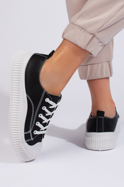 Tênis feminino modelo clássico preto... Tênis feminino modelo clássico preto...