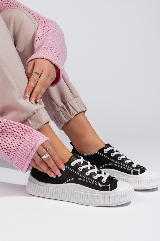 Tênis feminino modelo clássico preto... Tênis feminino modelo clássico preto...