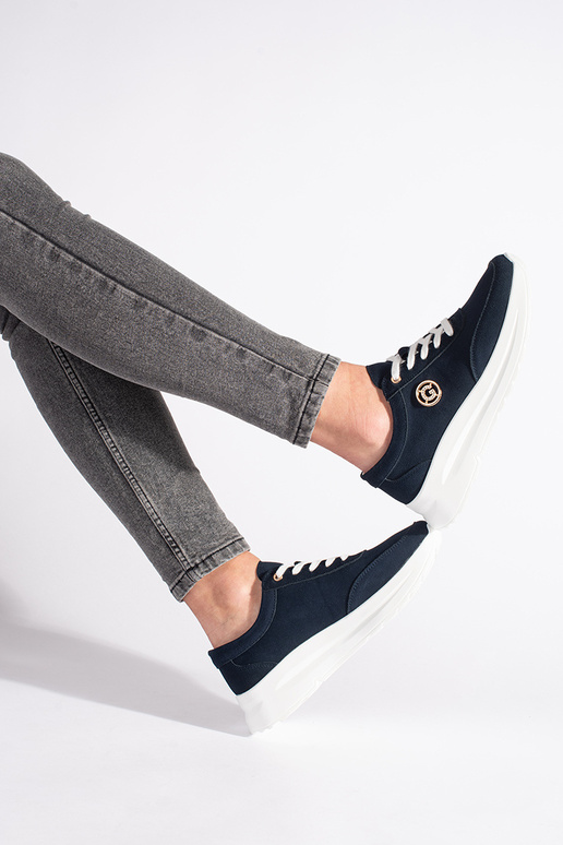 Tênis modelo tênis de couro azul...