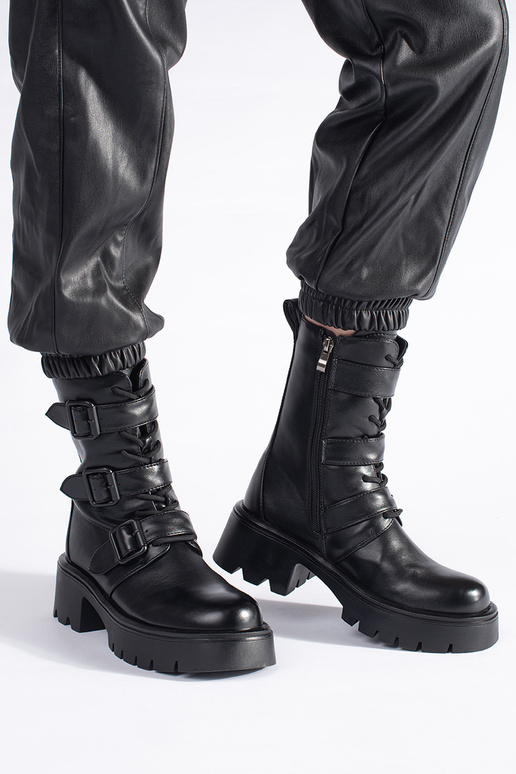 Botas altas femininas pretas com fivelas