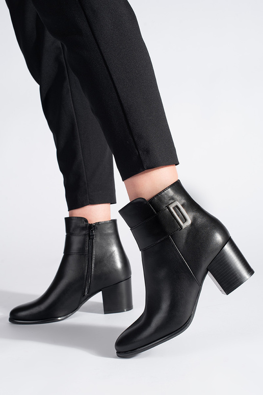 Modelo clássico, elegantes botas...