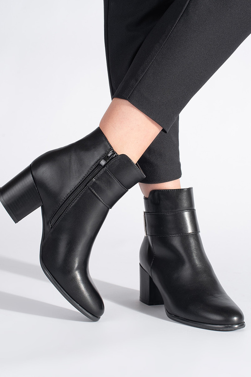 Modelo clássico, elegantes botas...