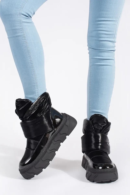 cor preta isolar Botas de neve...