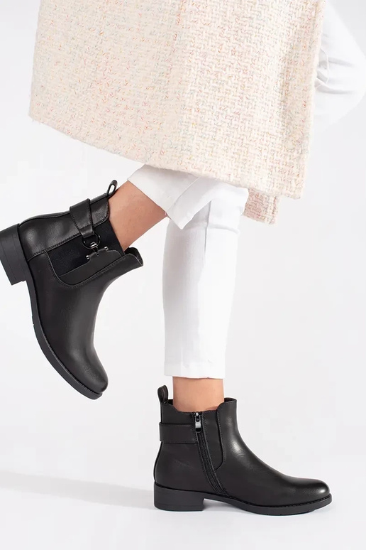 Botas Chelsea pretas planas de modelo...