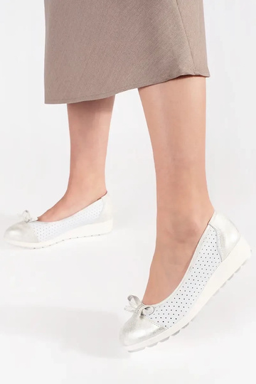 Mocassins dourados em... 2