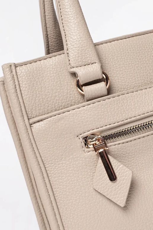 Bolsa na cor marfim com zíper